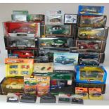 A large collection of larger die cast vehicles, mainly boxed examples, by Burago with others.