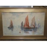 An early 20th century watercolour of a coastal scene with fishing boat, signed bottom right N