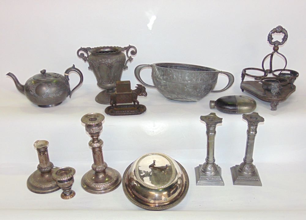 Mixed lot of silver plate and metal wares to include twin handled vases, cruet stands, candlesticks,
