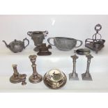 Mixed lot of silver plate and metal wares to include twin handled vases, cruet stands, candlesticks,