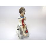 A Royal Worcester figure of Saturday's Child Works Hard For a Living in the form of a little girl