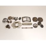 Six Art Nouveau buttons, steel buckle, silver Gloucester regiment brooch, etc