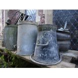 Three vintage galvanized steel dolly tubs with ribbed or fluted detail, together with a further