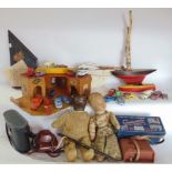 Vintage toy lot to include die cast toys and car garage, together with sailing boats, dolls, vintage