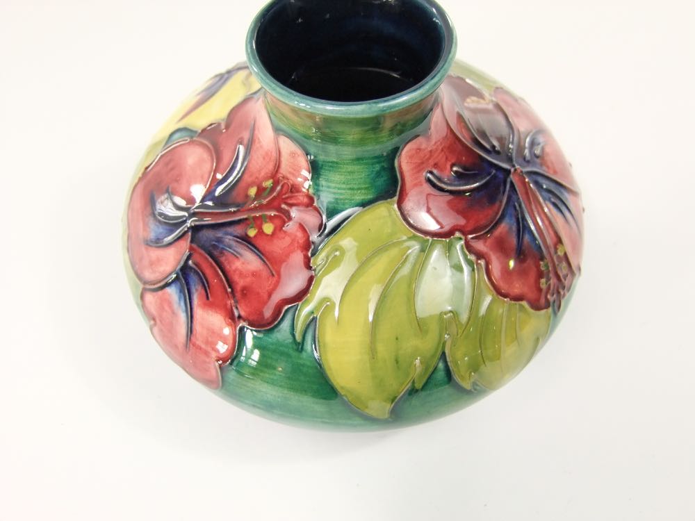 A Moorcroft vase of squat form with drawn neck and with raised and painted hibiscus decoration in - Image 3 of 3