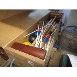A Jacques London croquet set in an original cardboard and wooden box together with a toboggan and