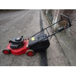 A Champion rotary petrol lawn mower R484SP