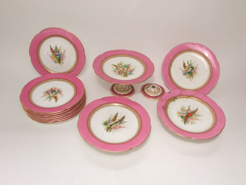 A collection of 19th century Royal Worcester pink bordered dessert wares with painted floral and