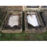 Two similar shallow weathered composition stone clad planters/troughs of rectangular form, (