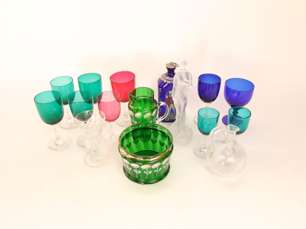 A collection of antique and later glass ware to include a blue glass decanter with overlay of a