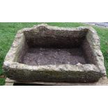 A rough hewn limestone trough, 100cm x 60cm