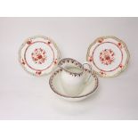 A small 19th century white ground jug and basin set with red and black printed border decoration