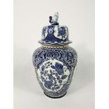 A large Belgian Boch vase and cover in the Delft manner with blue and white printed floral