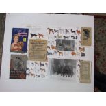 A large collection of assorted dog photographs, early 20th century dog manuals and books, etc.,