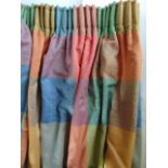 A pair of contemporary multi coloured curtains with slub weave, pencil pleat heading, lined and