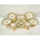 A good quality 19th century dessert set with pierced and gilded decoration to the borders and floral