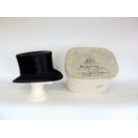 A good Scott & Co of Piccadilly brushed silk top hat and box together with two South American