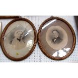 A pair of 19th century monochrome portraits of oval form, possibly over a photographic background,