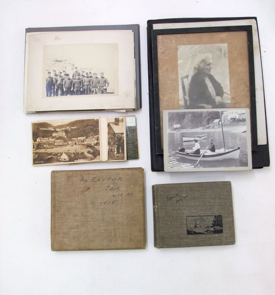 Three photograph albums containing a collection of family holiday shots and other interesting