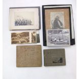 Three photograph albums containing a collection of family holiday shots and other interesting