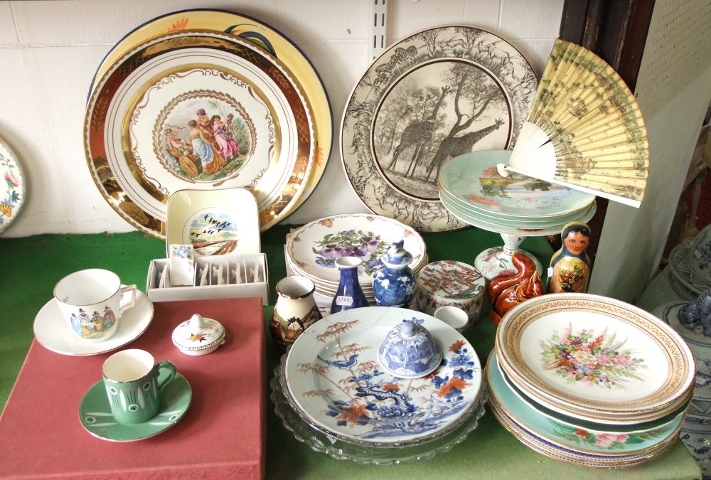 A boxed set of Palissy coffee wares comprising six coffee cans and six saucers together with further