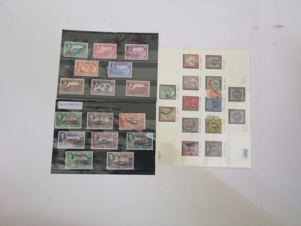 A box containing a quantity of Commonwealth and Empire stamps plus stamps from Egypt and Iceland.