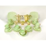 A collection of Royal Albert tea wares with green glazed finish comprising milk jug, sugar bowl,