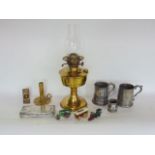 A mixed collection of metalware to include brass oil lamp, brass candle lantern inscribed Palmer &