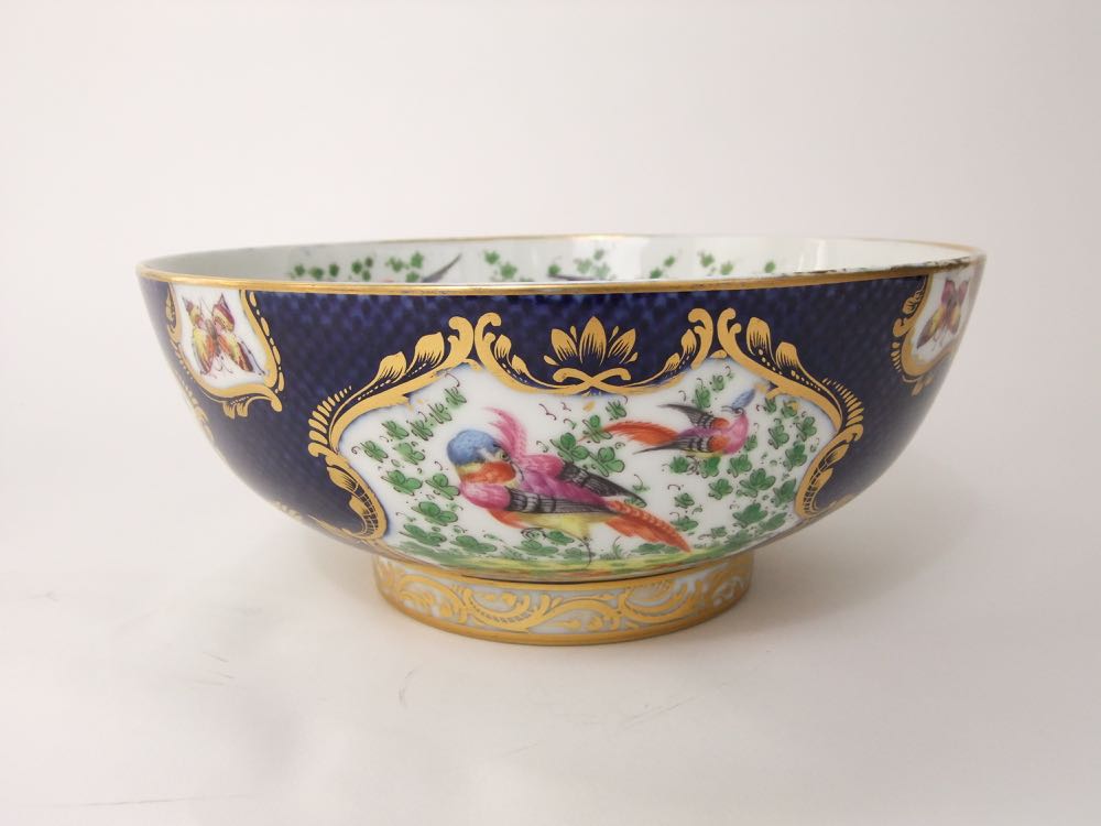 A 19th century punch or fruit bowl in the 18th century manner with blue scale ground and painted - Image 4 of 5