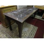 An Edwardian/early 20th century stained beechwood writing table of rectangular form with inset