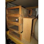 9 stained beechwood framed vintage haberdashery cabinet drawers with rectangular glazed panelled