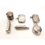 Mixed collection of bijouterie silver to include two vesta cases, a sovereign case, a whistle, caddy