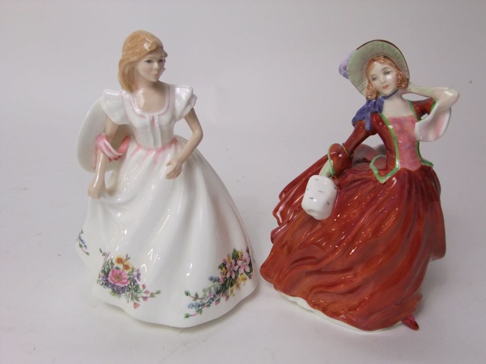 Two Royal Doulton figures, Autumn Breezes HN1934, and Joanne HN3422, a Nao figure of a girl with - Image 3 of 3