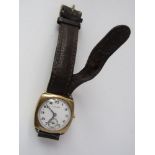A vintage 1930 9ct gold lug watch head by Vertex, with subsidiary dial and brown leather strap (AF)