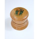 A mauchlineware cotton spool for three reels bearing the Tudor Arms of Gloucester, 10 cm max