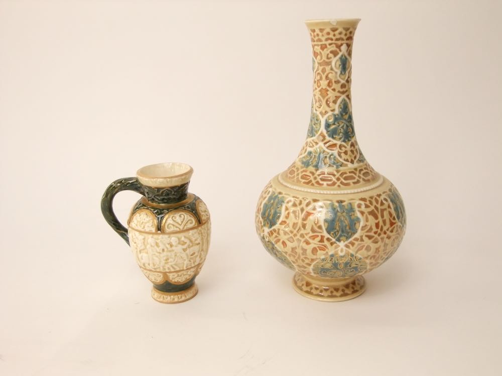 An early 20th century Hungarian Zsolnay Pecs bottle shaped vase with moulded and painted scrolling - Image 2 of 3