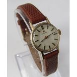 A vintage 9ct Omega ladies automatic bracelet watch with recent brown leather strap