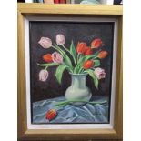 A 20th century oil painting on board of a still life with vase of tulips, signed bottom right Eric