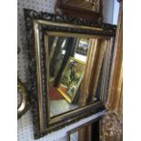 A small Georgian mahogany wall mirror with fretted outline together with a 19th century wall