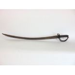 An antique iron and steel cutlass with pierced hand guard and turned wooden hilt.