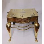 A good quality Georgian polished brass and steel footman with shaped supports, pierced detail,