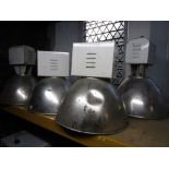 A collection of six vintage industrial light units with chromium shades