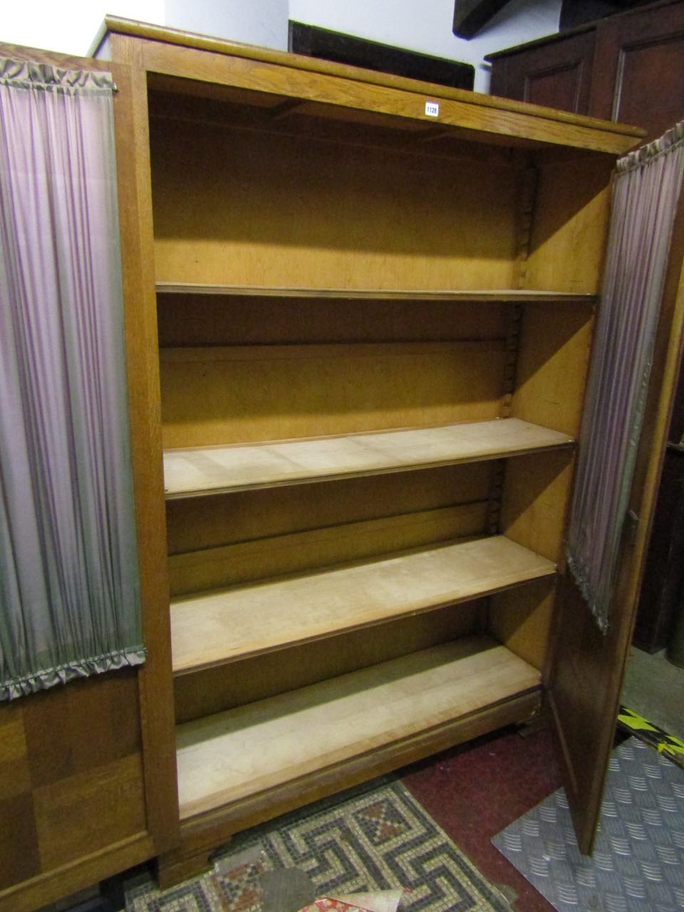 A pale oak freestanding cupboard enclosing three adjustable shelves enclosed by two partially glazed - Image 2 of 2