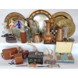 A large mixed collection of miscellaneous items to include copperware, glassware, mirrors, chargers,