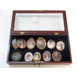 A quantity of 19th century and later portrait miniatures, all of oval form, including a bearded male