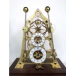 Devon Clocks grasshopper skeleton mantel clock, with original Devon Clocks key, the brass clock