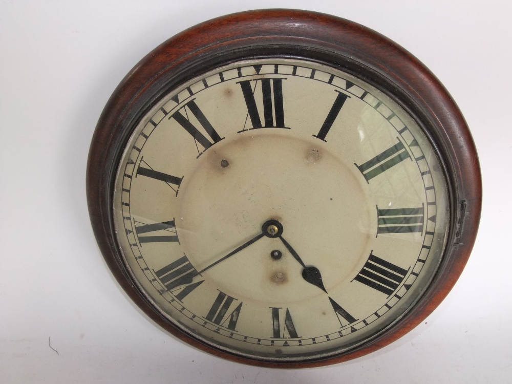 A single fusee 12 inch wall dial clock within a mahogany case