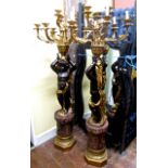 A pair of 18th century style candelabra (fitted for electricity), the nine branches supported in