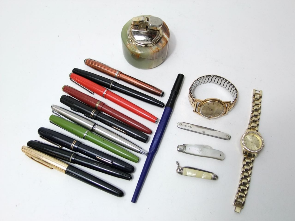 A collection of nine vintage fountain pens, by Swan, Esterbrook, Conway, a silver backed fruit