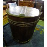 A substantial pine tub bound by birch twigs and complete with lid, 85 cm high